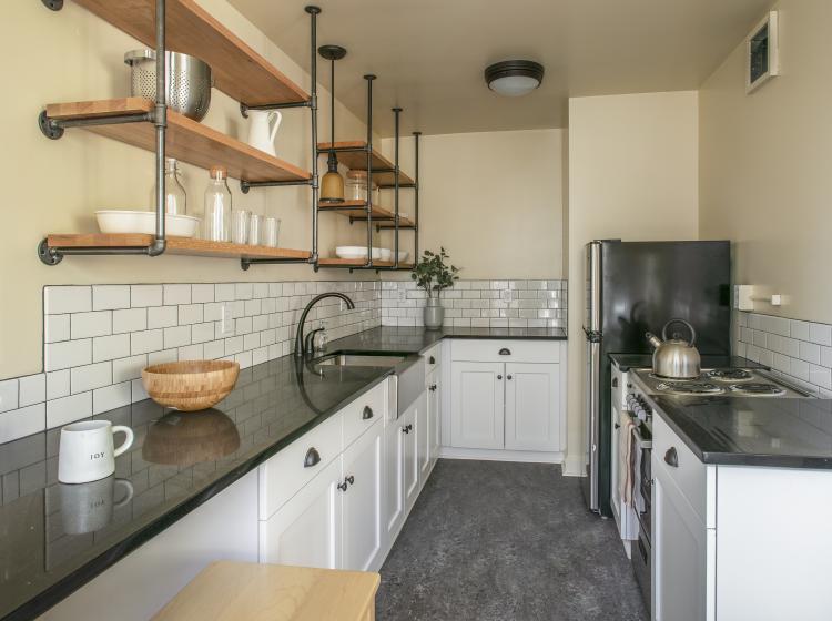 Kitchen has full-size stainless steel appliances