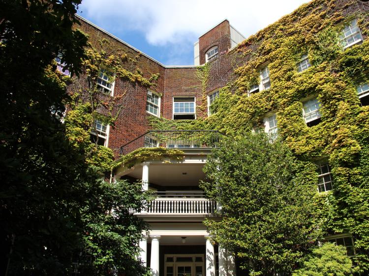 Exterior shot of ivy-covered Montgomery Hall courtyard enterance