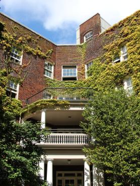 Exterior shot of ivy-covered Montgomery Hall courtyard enterance