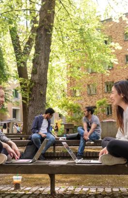 students with computers on Park Blocks