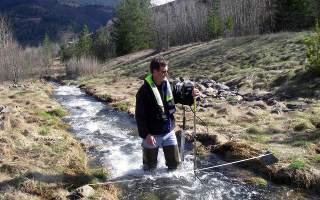 USGS Hydrologist Greg Clark measures streamflow on Government Gulch Creek