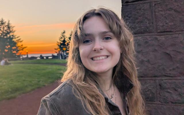 Jacquelyn Oetterer, outdoors at sunset.
