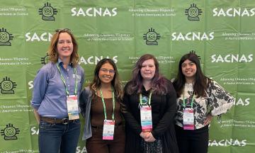 Photo of Alex Etheridge and LSAMP students at SACNAS