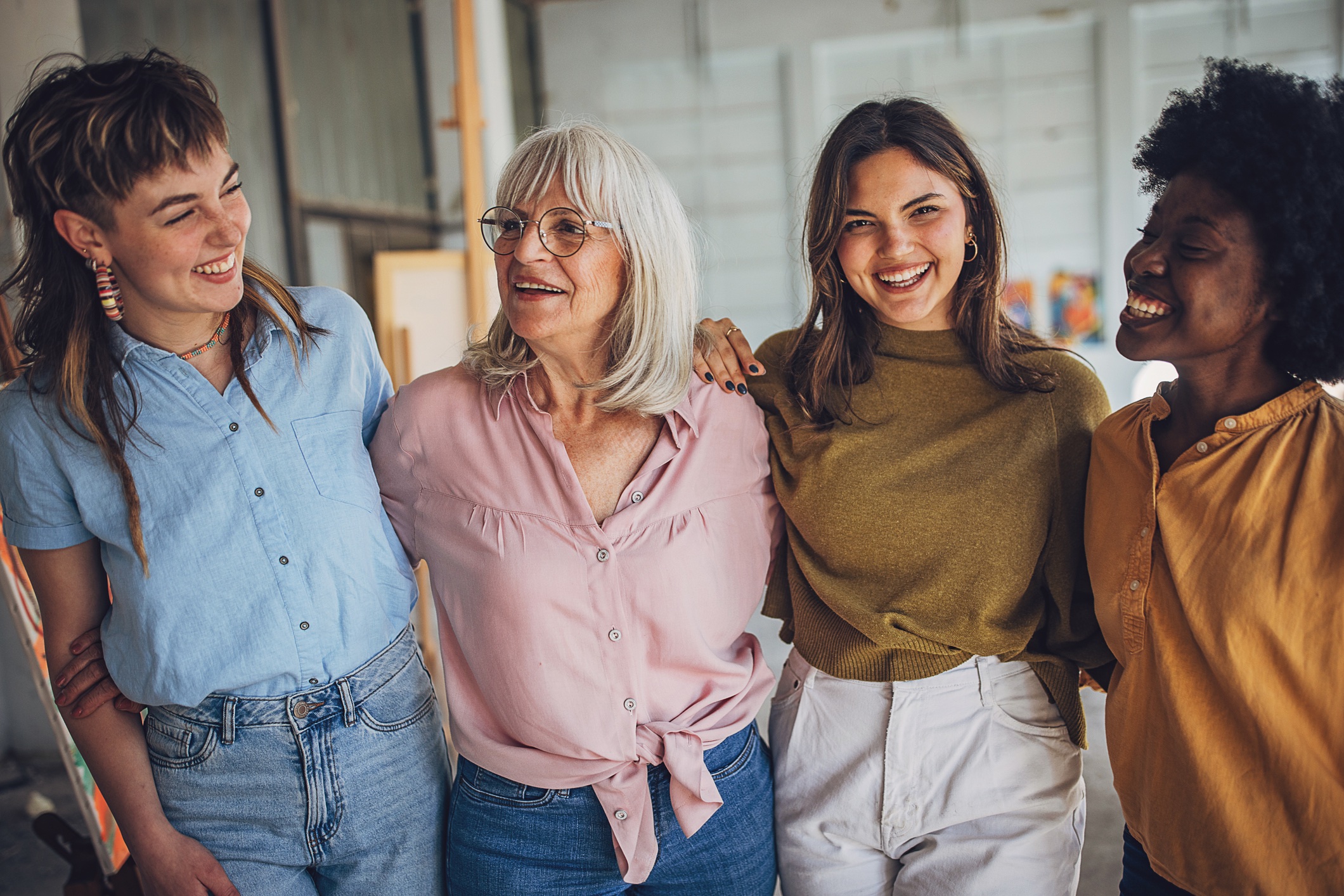 An image showing a senior adult with young adults