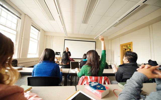 Teacher at front of classroom