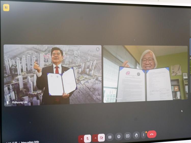 Dongdaemoon Autonomous District in Seoul, South Korea and PSU's School of Social Work had a virtual MOU signing ceremony on February 18, 2025.  Pictured here is Mayor Phil Hyung Lee and Dean of the School of Social Work Evaon Wong.