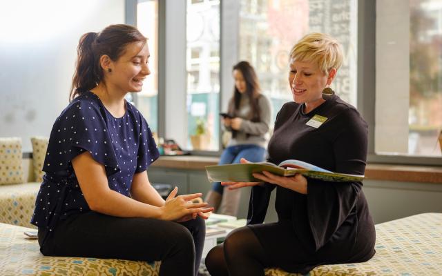 Image to two people meeting