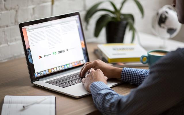 Image of working on laptop