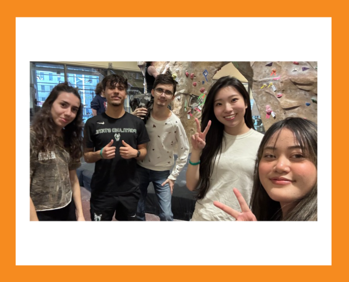 Group of international and domestic students at the Campus Rec Rock Wall