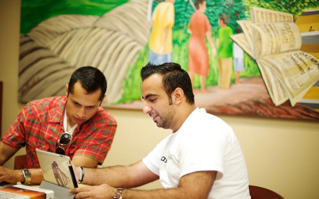 Two students studying together in classroom