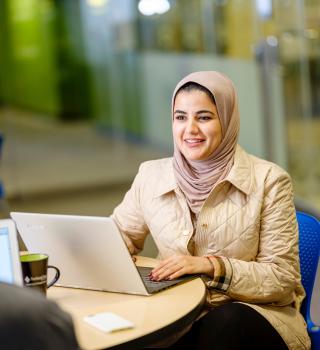 Student working on laptop