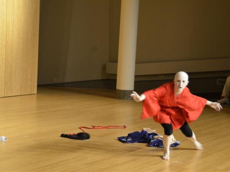 Performer dancing on stage