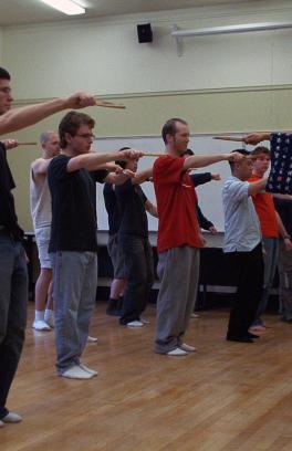 photo of Professor Laurence Kominz instructing a Japanese Theater course.