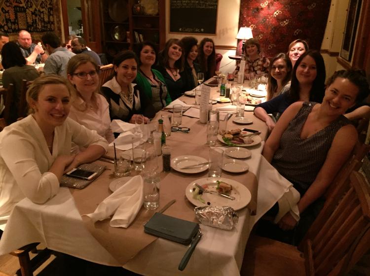 Photo of a group of PSU social psychology faculty and students sitting around a dinner table at a restaurant during a dinner at SPSP 2017.