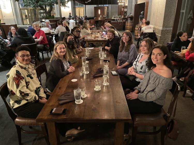 Portland State University faculty, students, and collaborators at a restaurant during the 2023 Annual SPSP Conference