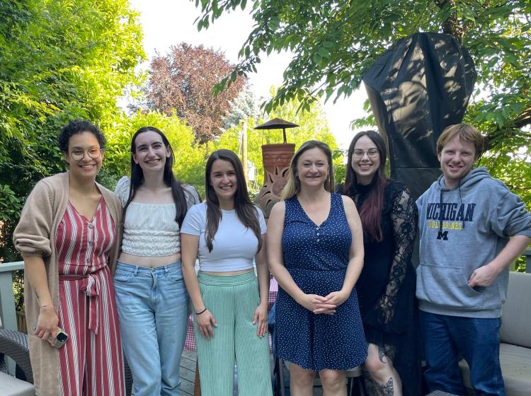 GRASP Lab members in June of 2023 standing side by side in front of a forested background. From left to right: Kiara Hunt, Lyndsey Meador, Aeleah Granger, Kimberly Kahn, Emma Money, Jared Cutler