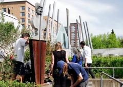 Class working on garden in Native American Center