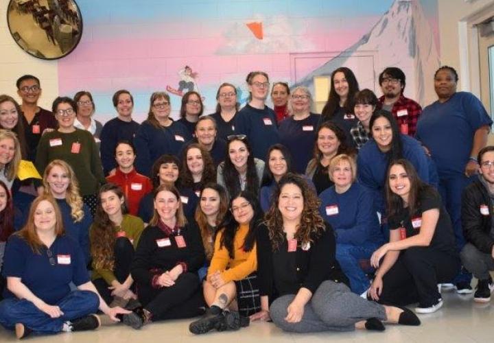 Group of incarcerated women posing for photo