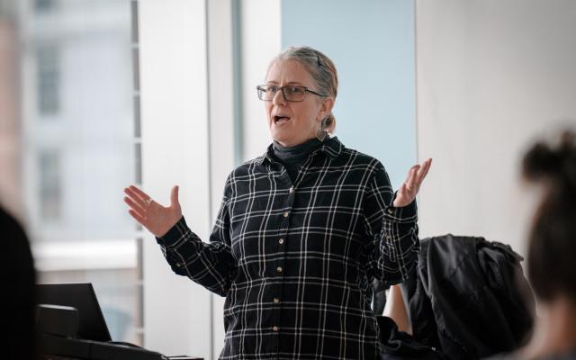 Professor in front of classroom