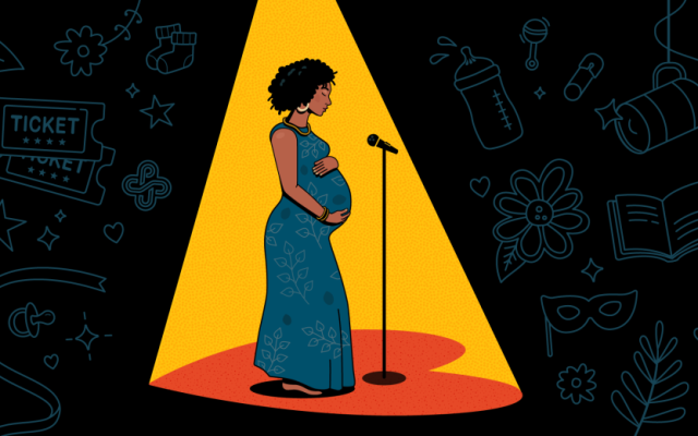 A pregnant woman in a spotlight standing in front of microphone on a stand