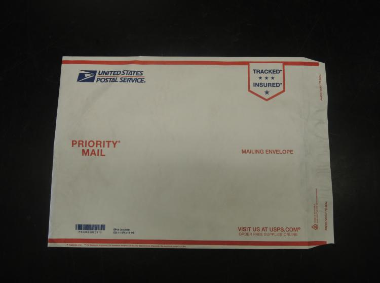 Photograph of a generic USPS package