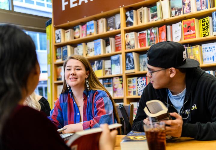 students sitting at table 