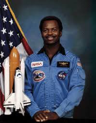 Photo of Dr. Ronald E. McNair in his NASA astronaut uniform.