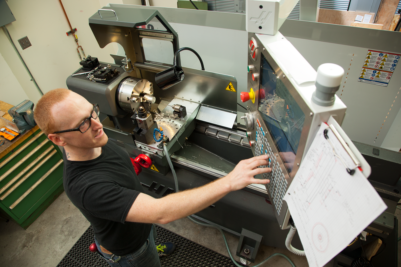 Student working on CNC mill