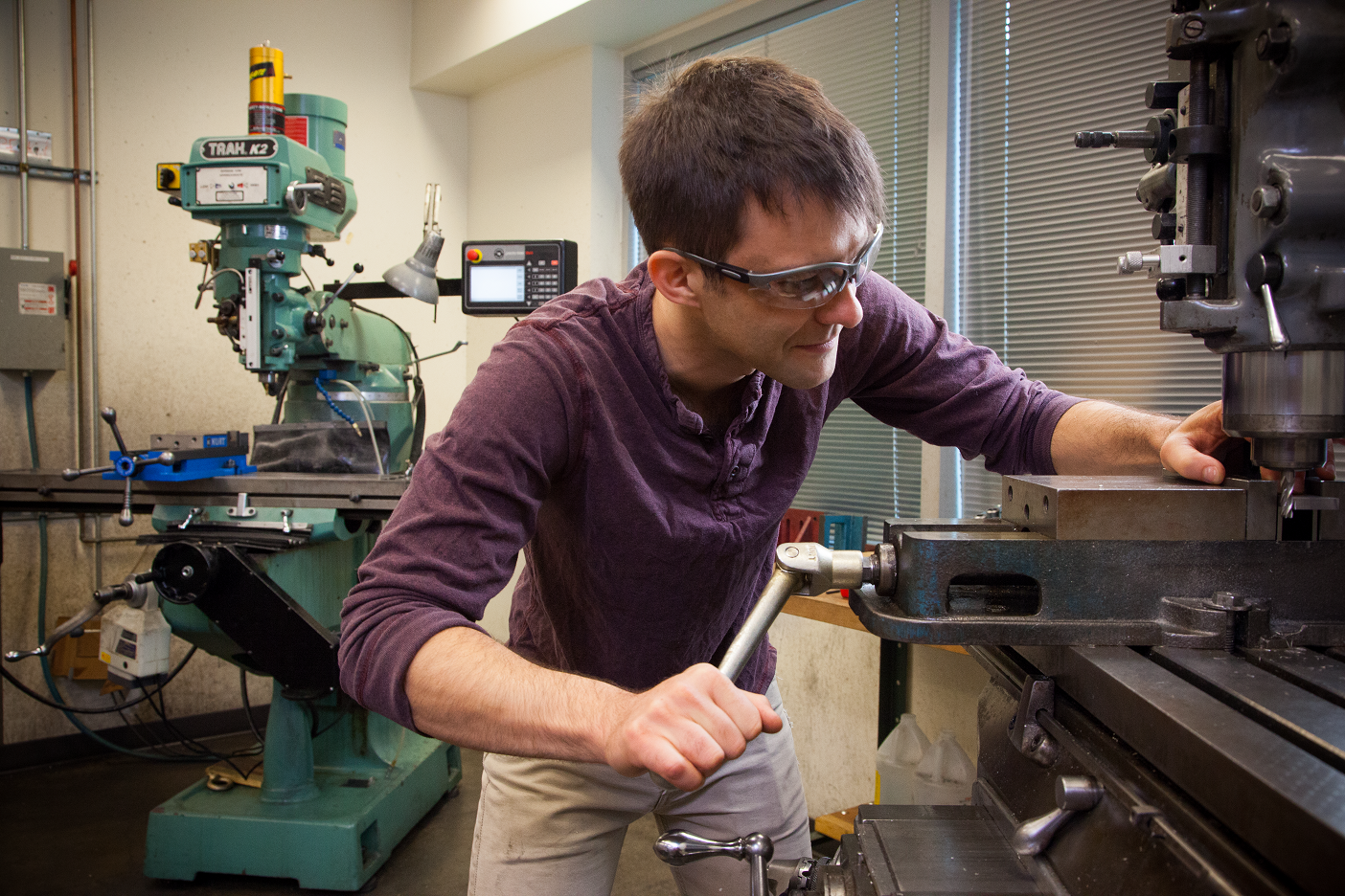 Student working in the machine shop