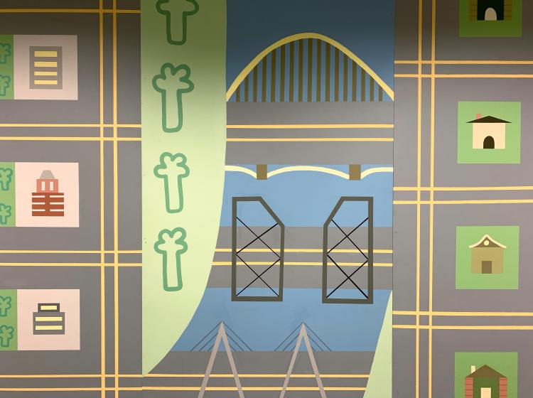 Close-up of the mural, showing buildings on street grids with a river in between, crossed by the Fremont, Hawthorne and Tilicum bridges.