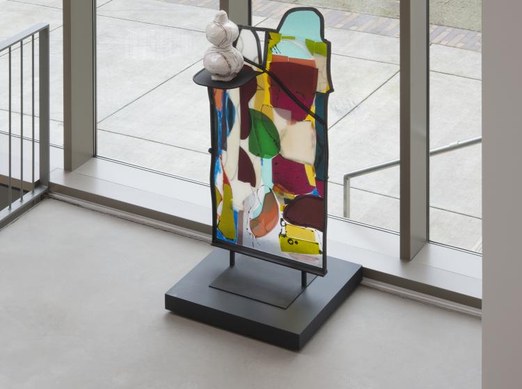 View from above of the sculpture, in front of the Peter Stott Center atrium’s floor-to-ceiling windows.