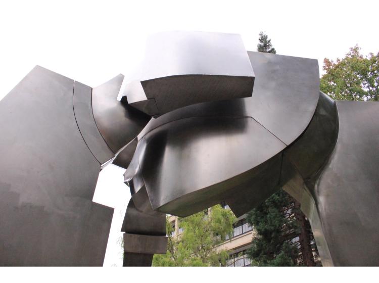 Close-up of the upper portion of the sculpture, as seen from below and at an angle.