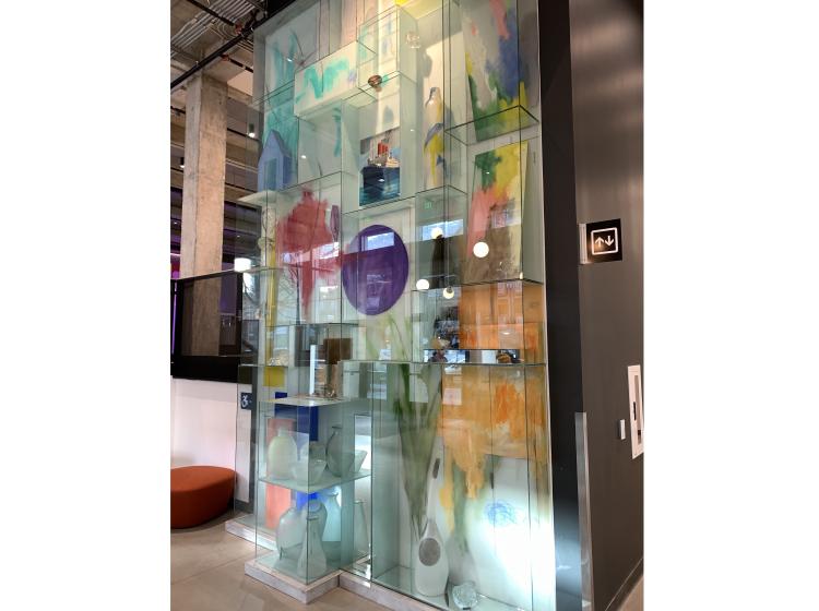 The artwork is seen at an angle from the right