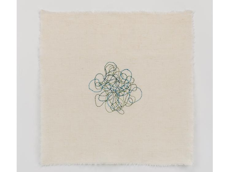 Stiched artwork with a green and blue squiggly lines at center, on off-white background