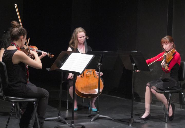 A student string quartet in recital