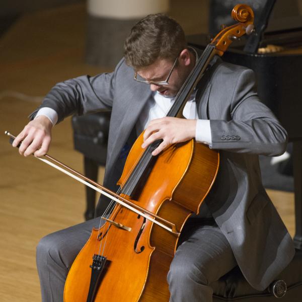 Cello student performing in recital