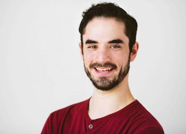 Headshot of PSU Theater Arts alumni Sam Morrison.
