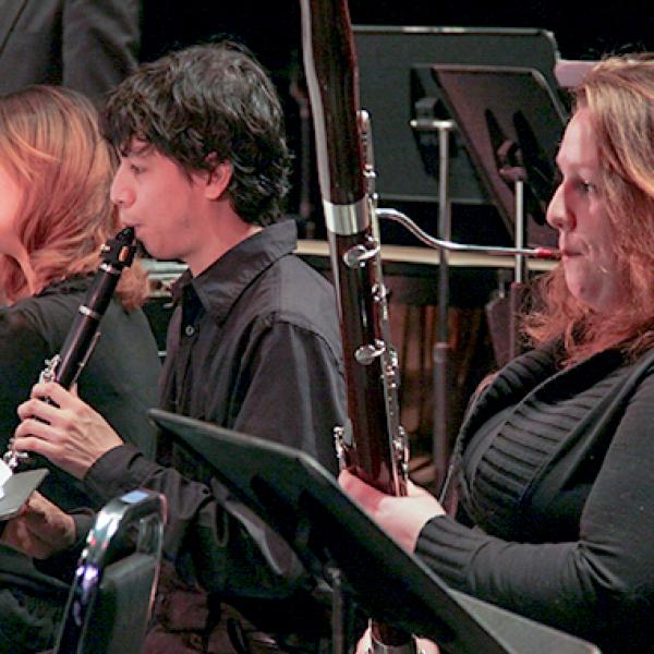 Woodwind players in performance