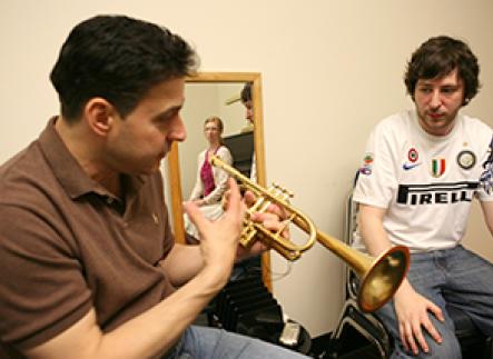 Brass student and teacher in private lesson