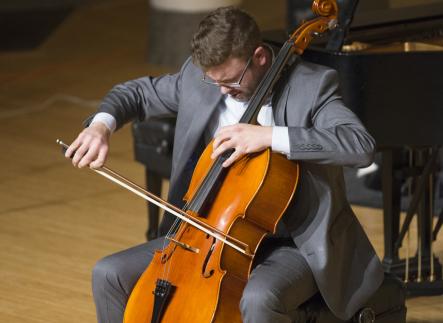 Cello student performing in recital