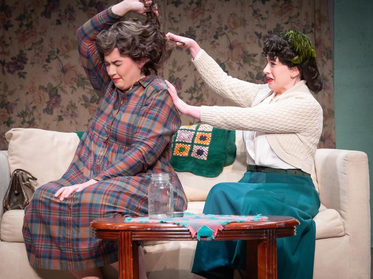 Maggie helps Della in PSU Opera's "The Gift of the Magi"
