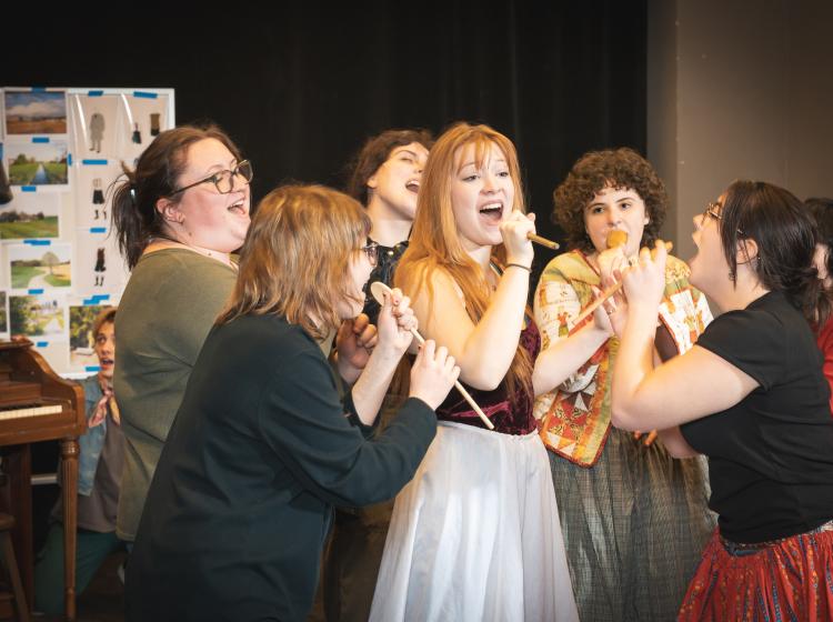 A group of young women singing