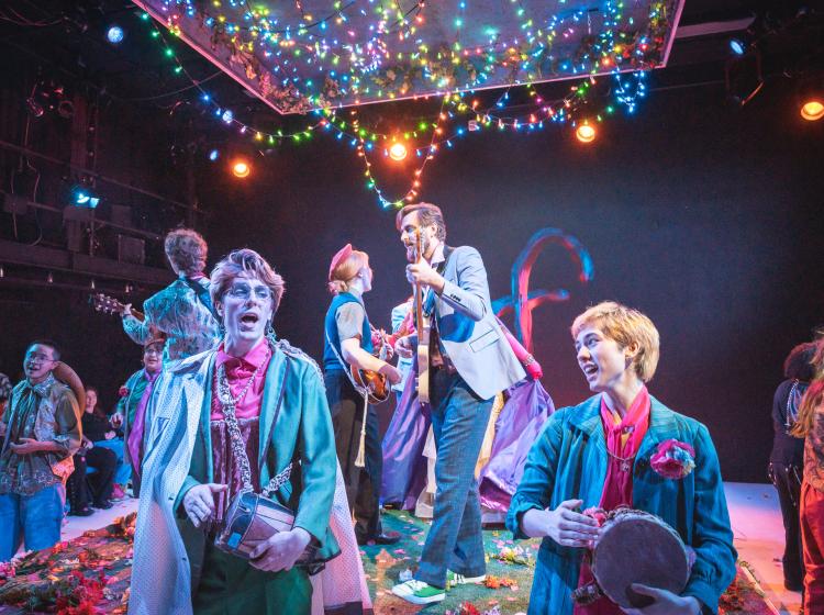 Cast and musicians of "As You Like It" singing.
