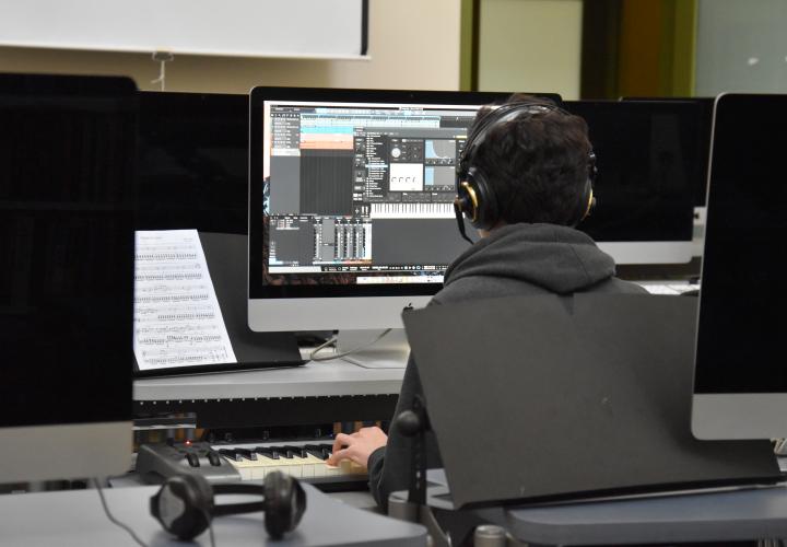 SAMP Student editing audio on a computer