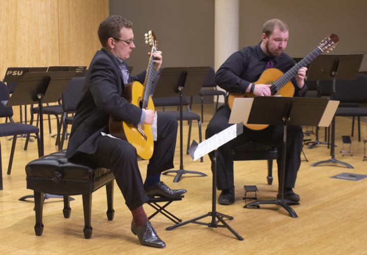 Guitar students in performance