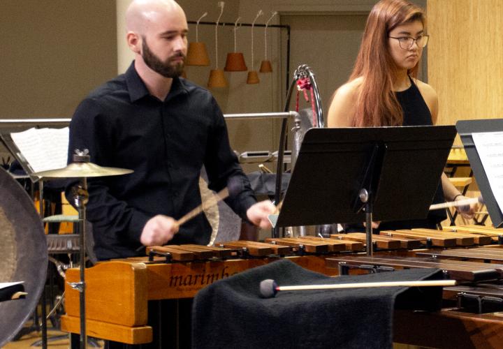 Percussion ensemble students performing