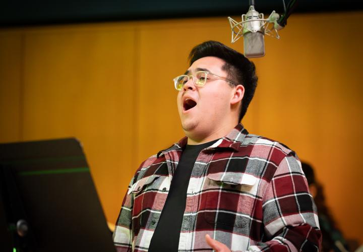 PSU Choir student singing a solo.