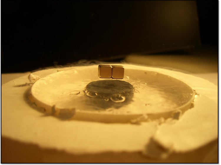 Demonstration of Meissner effect using sintered YBCO pellet cooled with liquid nitrogen