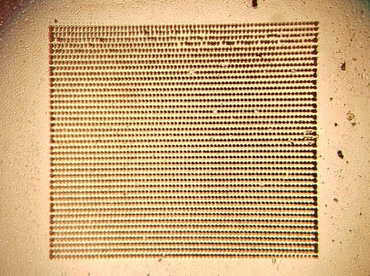 Fast scan ablation of a ceramic substrate by a high energy 266 nm laser