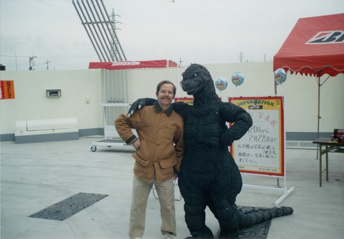 Charlie next to Godzilla replica